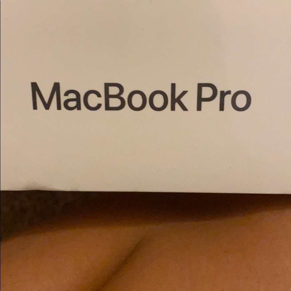 Brand new still in plastic MacBook pro